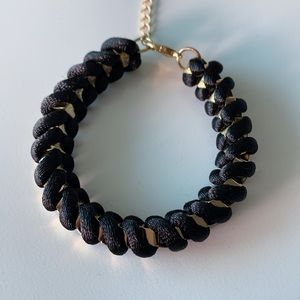 Bracelet- black thick string with gold chain